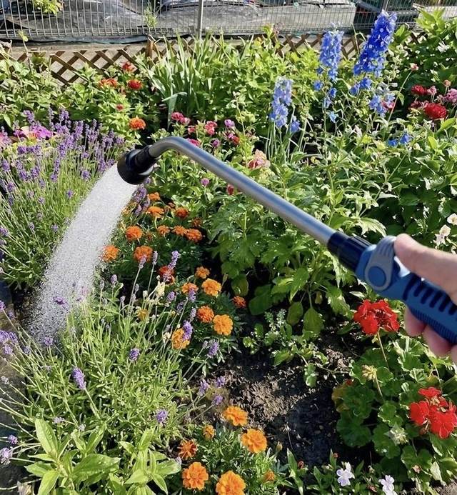KAKUICHI Shower Long being used to water a flower garden